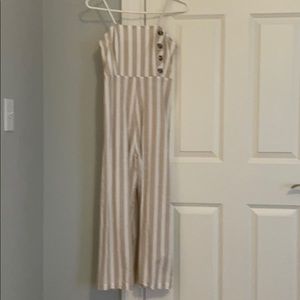 White and tan romper.